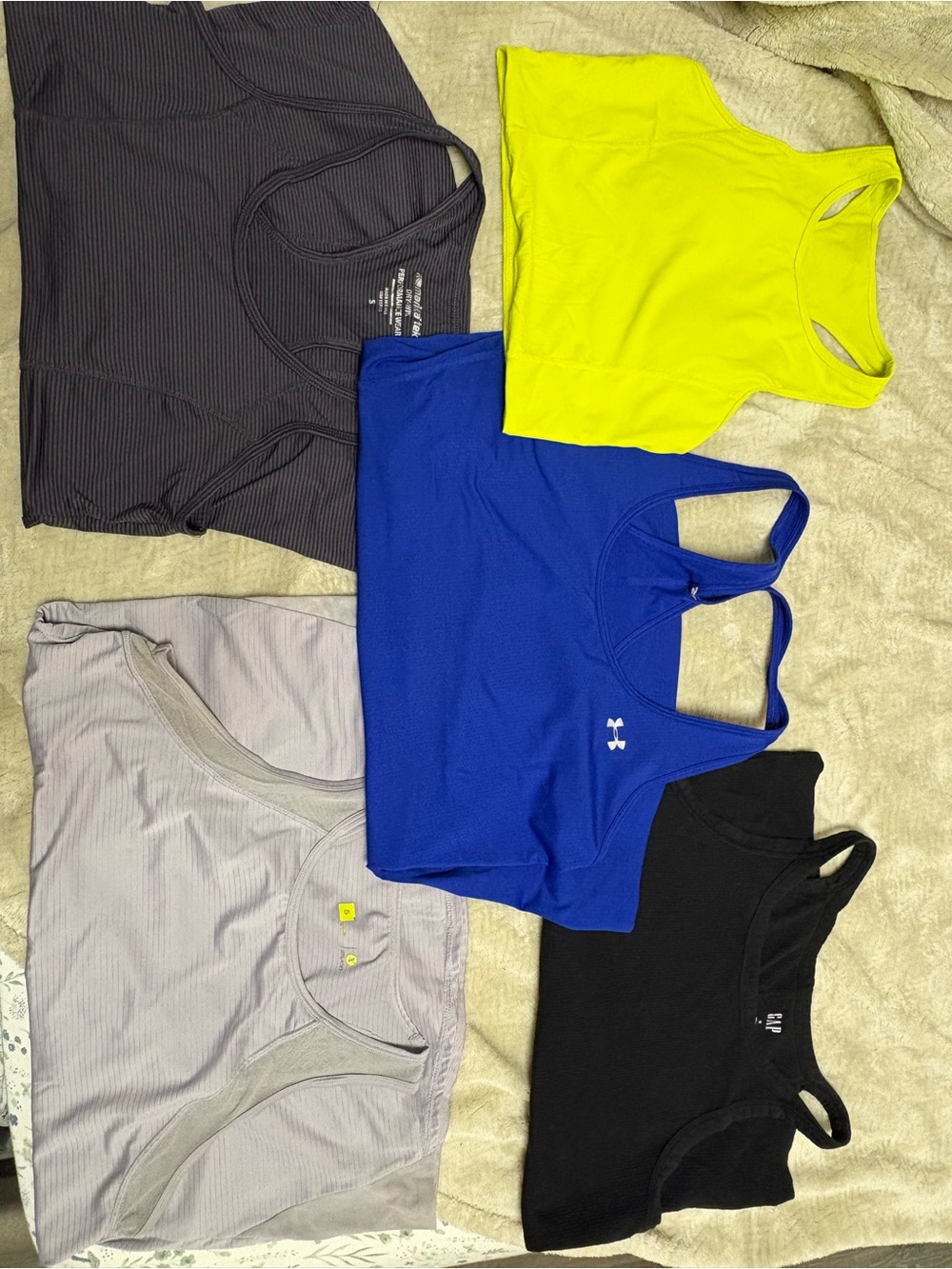 Women’s athletic tank tops, full length all together.